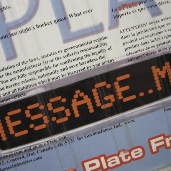 SCROLLING LICENSE PLATE FRAME new sealed in package w/ remote control unit - Picture 10 of 17